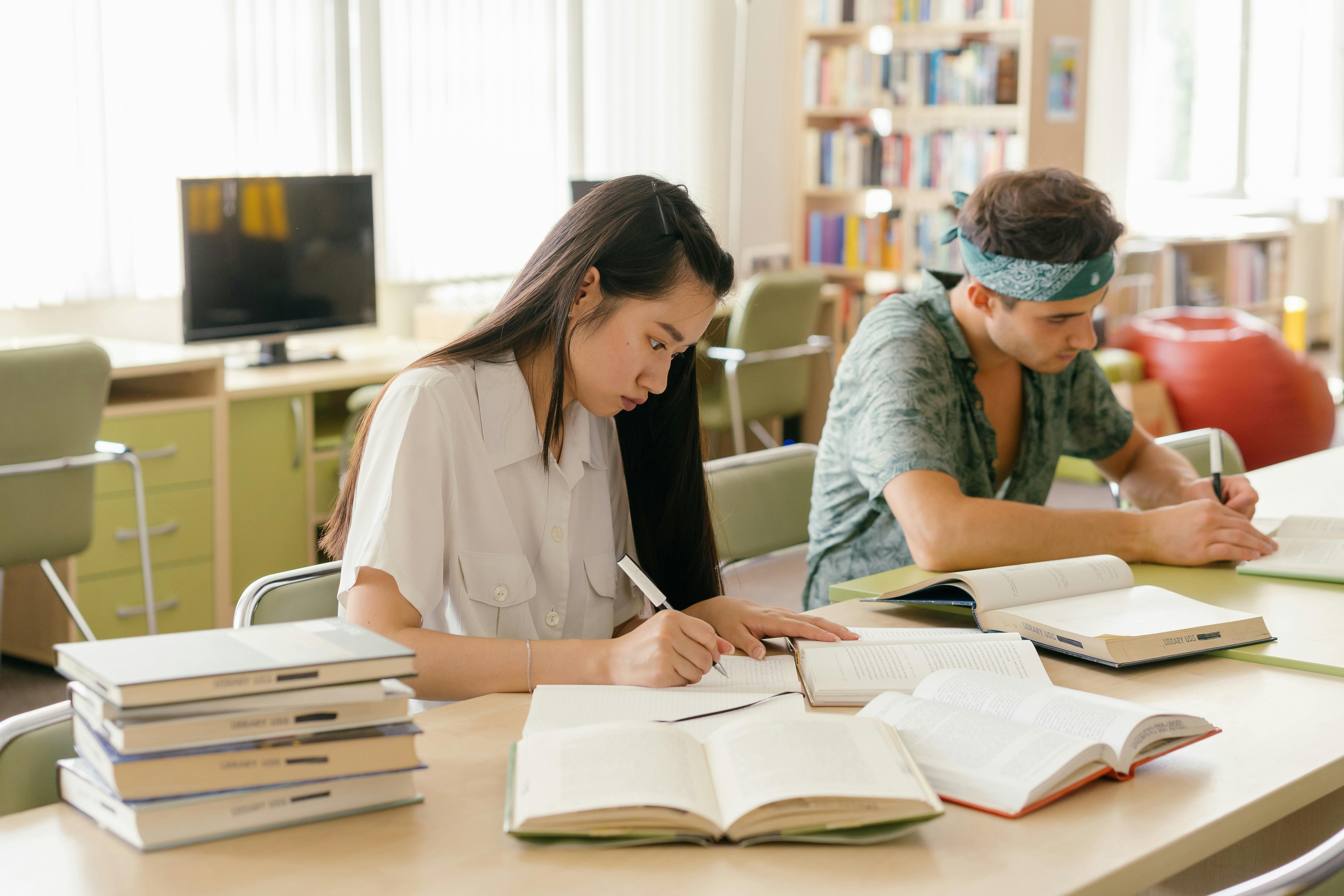 Students studying together in a library