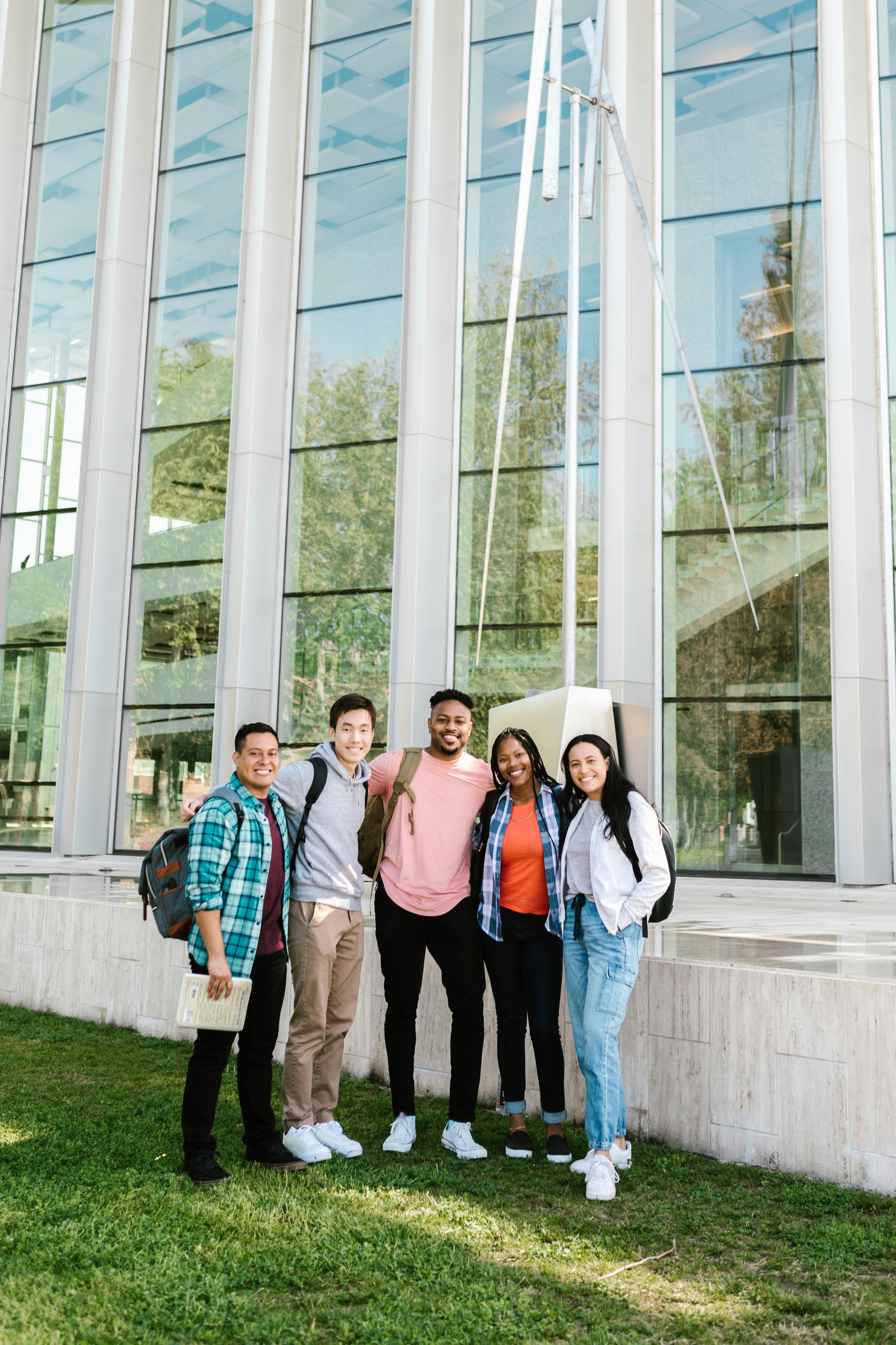 Diverse group of students outside a modern building in Vancouver